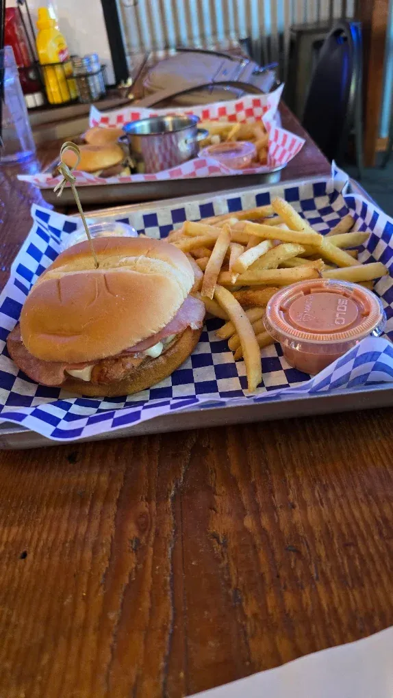 Burger and fries on a checkered basket at Old Mill Tavern in Peshastin, WA