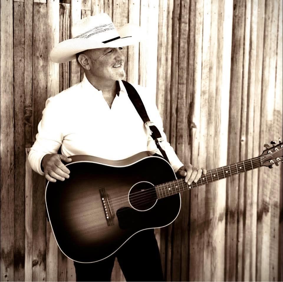 Chris Ward with acoustic guitar at Old Mill Tavern in Peshastin, WA