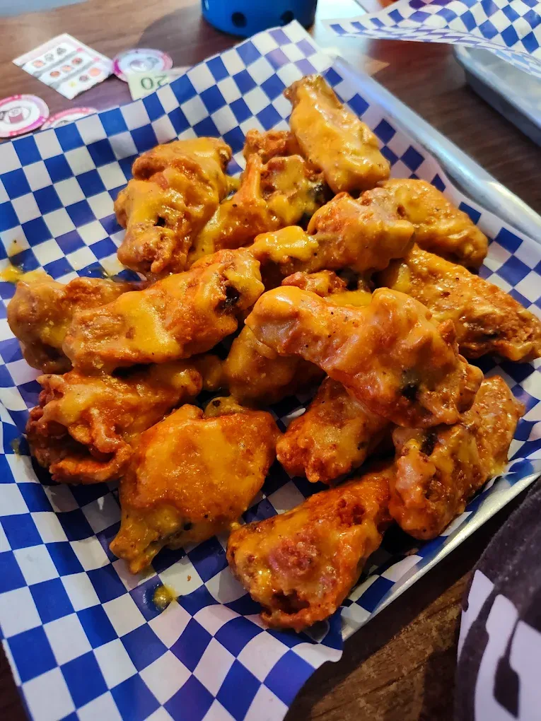 Basket of Local Fav wings tossed in sauce at Old Mill Tavern in Peshastin, WA