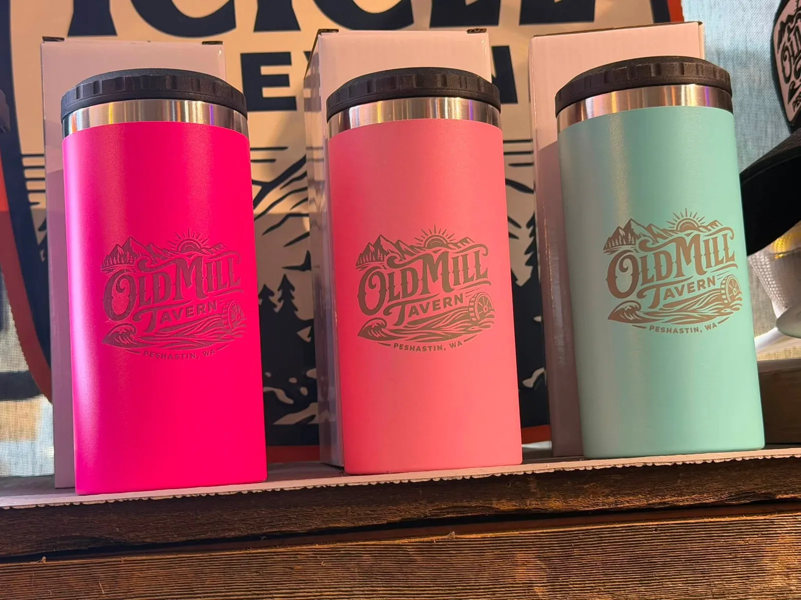 Old Mill Tavern logo tumblers lined up on the bar in Peshastin, WA