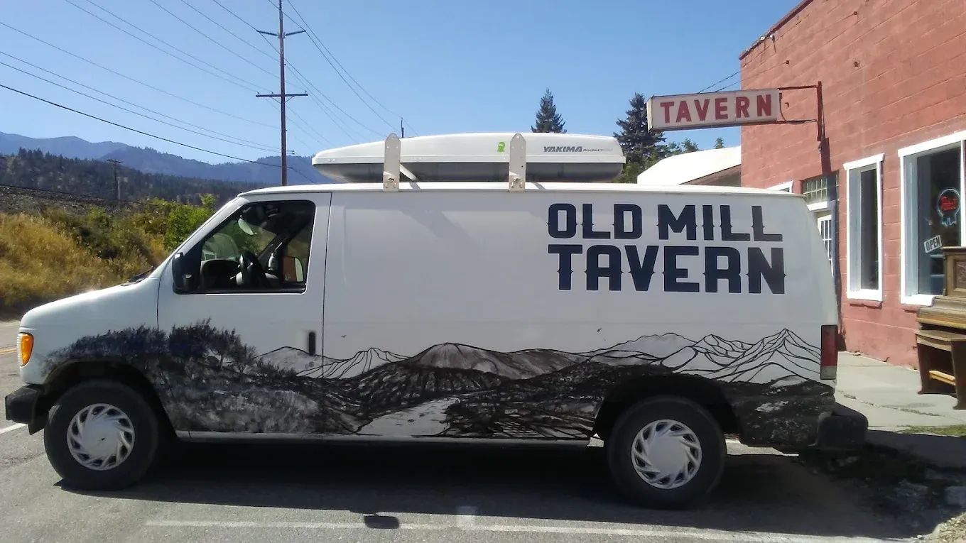 Old Mill Tavern delivery van parked on Main Street in Peshastin, WA