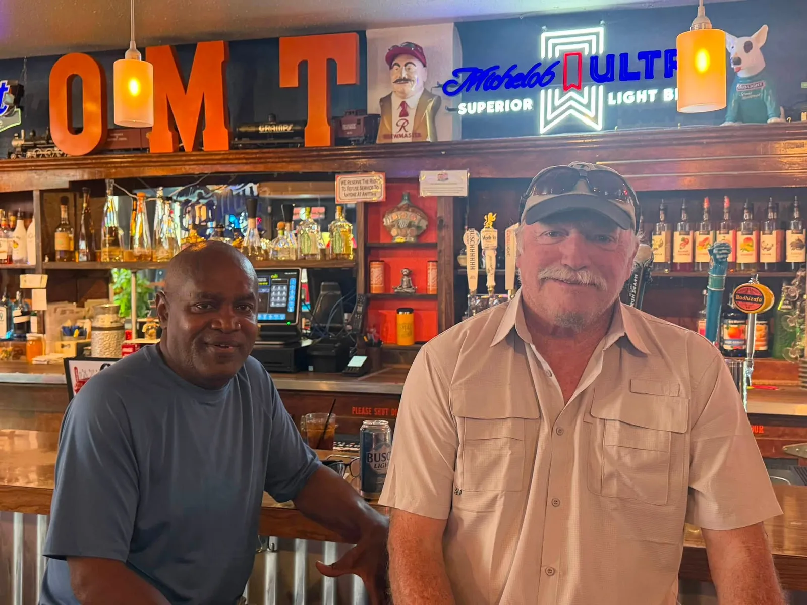 Regulars visiting at the bar at Old Mill Tavern in Peshastin, WA